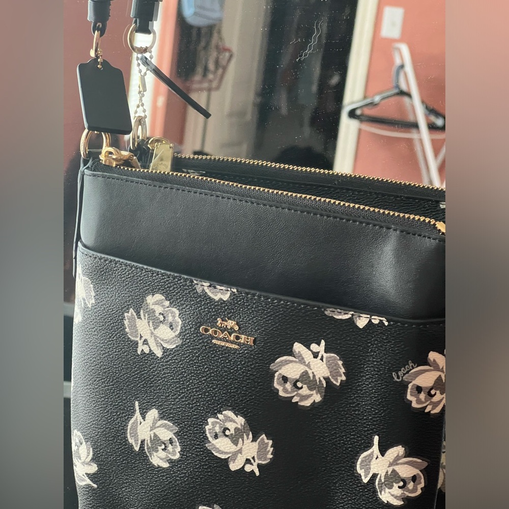 Black floral Coach shoulder crossbody bag purse